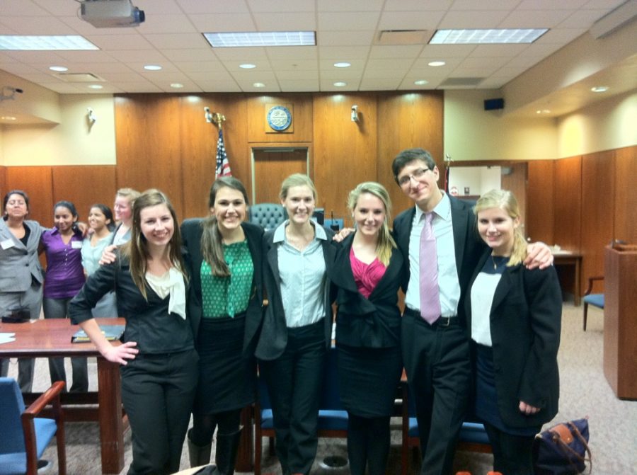 The elder members of Mock Trial team pose after they complete their competition. From left to right: Maddie Maney (12), Sophie Shephard (12), Kathryn Wittoesch (12), Anna Johnsen (12), Josh Halpern (12), Jackie White (11)