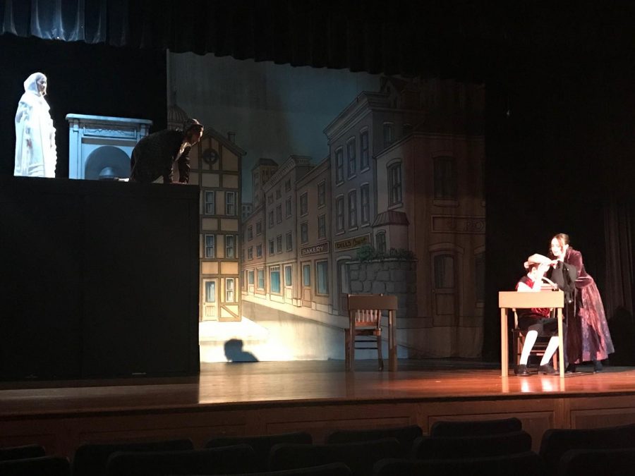 This years fall play combined multiple elements of set design. Set pieces with multiple levels as well as the choice to use backdrops on specific sides of the stage created director, Jenna Hills vision.