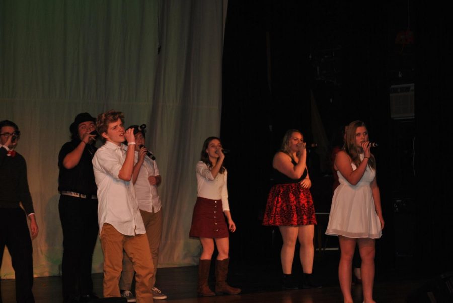 Synergy members, Andy Danis (9) and Brooke Lanning (9) sang solos for the song, Winter Wonderland”.    
 Photo by: Ale Garcia