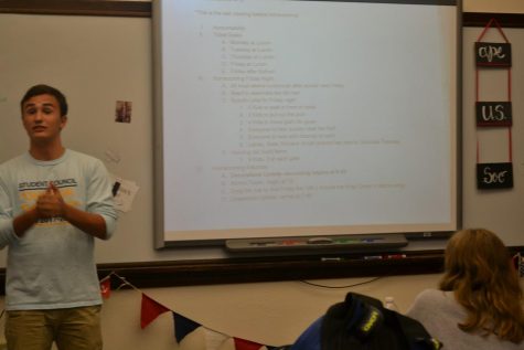 Party Prep: Senior class president Jack Henry leads the meeting, confirming plans and making some final announcements.