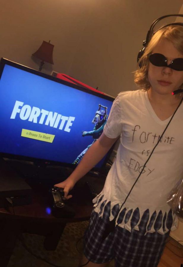 Ready for action: Nathan Wertz (7) boots up Fortnite to save John Wick.