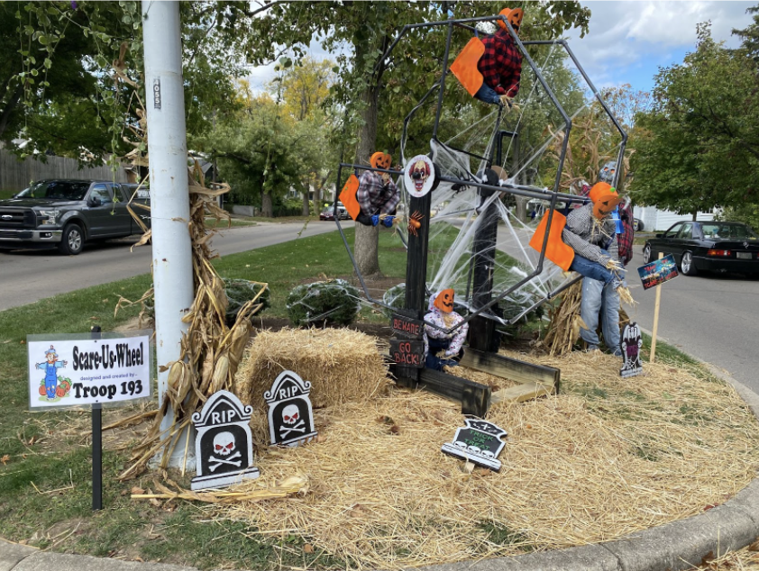 Wheel Winners: Troop 193 takes first place in this year’s Scarecrow Row with the Scare-US-Wheel. Evan Hiebert (12) said, “I really like the ferris wheel and it’s interesting, I feel like it was definitely a challenge to create, which makes it cooler because it shows they put in a lot of effort.”
