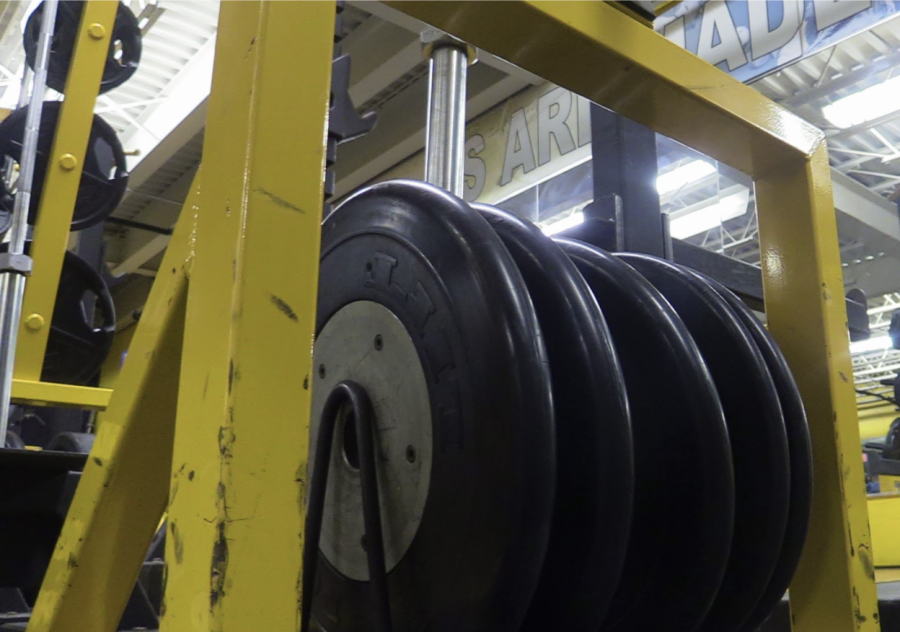 Daunting Debacle: The school’s weight room, where athletic teams train.