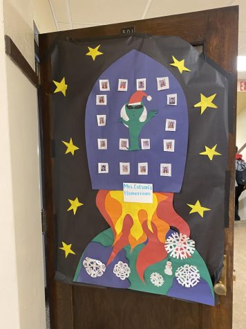 Space Chase: Kelly Colson’s “out of this world” themed door has each of its students on the space-themed door. Colson said, “My door is out of this world!”