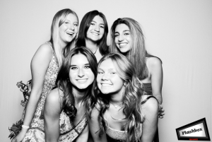 Prom Pals: At last year’s prom, Ellerie Nye (12), Avery Pohl (12), Sapphira Elsebaei (12), Claire Potter (12) and Erin O’Neill (12) pose in the Flashbox photo booth, which is typically featured at the majority of dances.