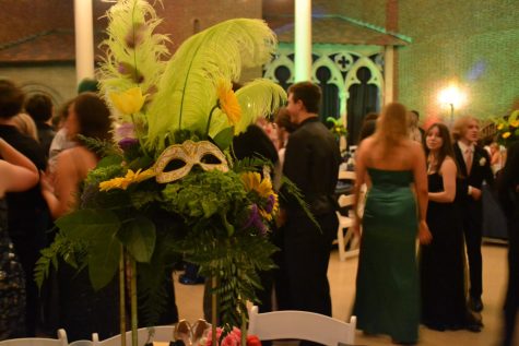 Mysterious Masquerade: This years prom theme was “The Masquerade,” with tables decorated with flowers and masks to set the scene. Sarah Casebere (12) said, “The venue is so pretty, I like how everything has been set up.” Photo by: Sage Spirk