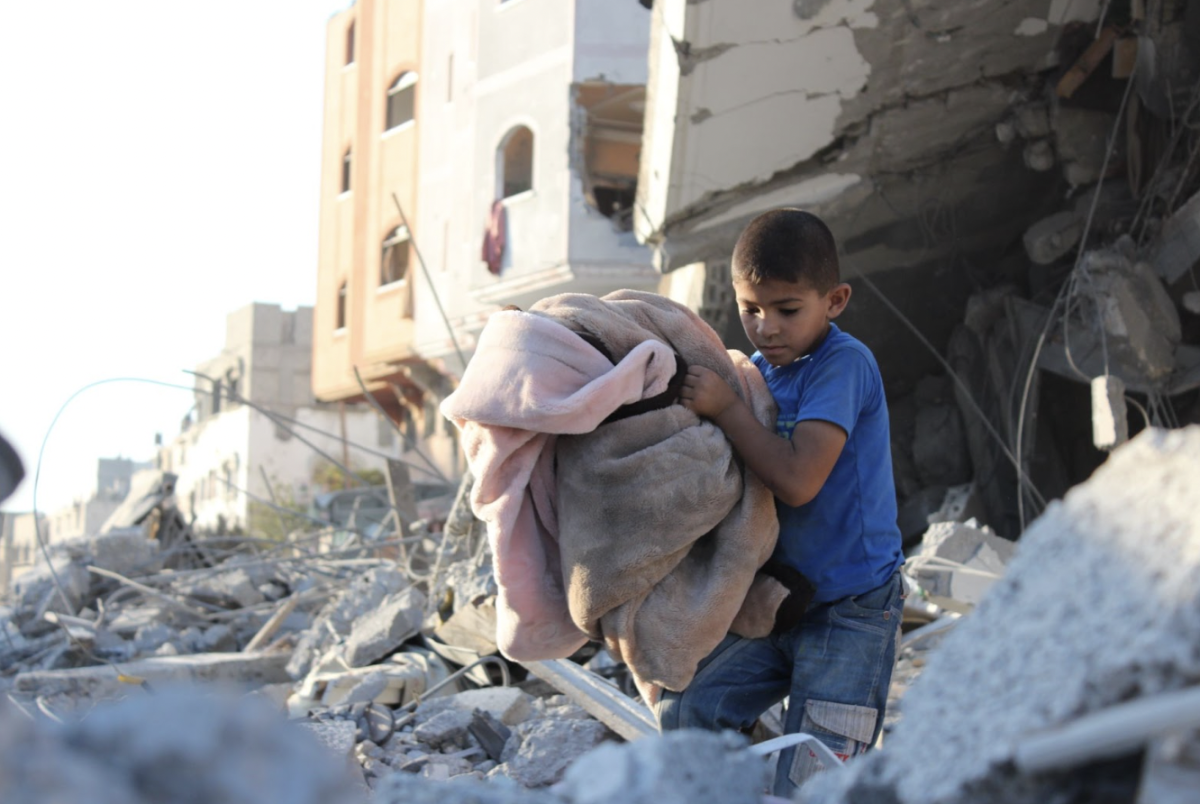 War Torn: A child rummages through the rubble on the Gaza strip. Photo: Pixabay