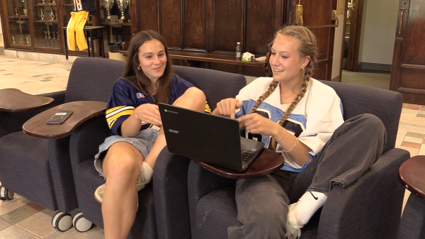 Seniors Sally Altenburg and Maya Florendo enjoy the senior chairs in May of 2025.